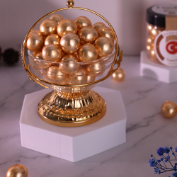 ملبس ذهبي بندق شوكولاته حليب