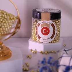 ملبس تركي لؤلؤ `ذهبي  مغطي شوكولا حليب 150 جرام